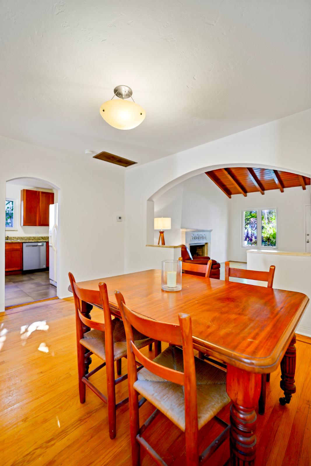 Dining room view emphasizing scale, light, and interior flow