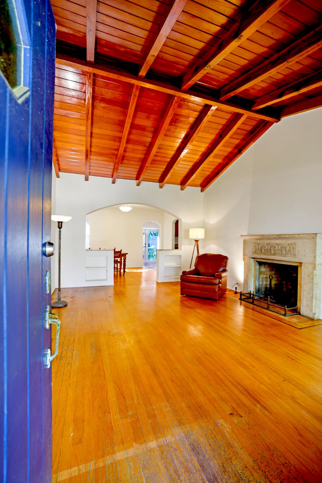 Great room perspective showing wood ceiling detail and open living area
